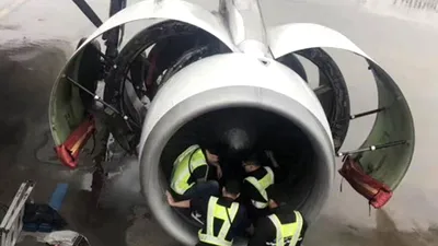 Un zbor a fost întârziat după ce o femeie a aruncat monede în motorul avionului pentru noroc