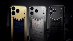 Caviar lansează accesorii magnetice de lux pentru iPhone 17 Pro Max. Un model include un fragment de fosilă T-Rex