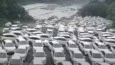 Imagini incredibile din China: Mii de mașini electrice, abandonate în parcări