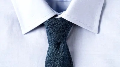 O firmă produce cravate din pânză de păianjen