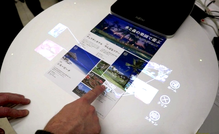 Fujitsu pregăteşte interfaţa touch interactivă pentru ziare tipărite