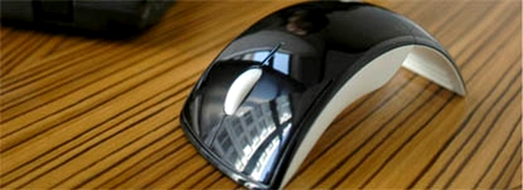 Wireless Arc Mouse in actiune