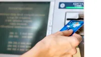 TAXĂ la bancomat. Avertisment pentru cei care retrag bani de la ATM