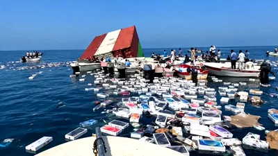 Strâmtoarea Ormuz: Pescarii iranieni caută în epava unei nave scufundate pentru a recupera iPhone-uri și parfumuri de lux